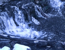 The stream from the higher pond of the valley